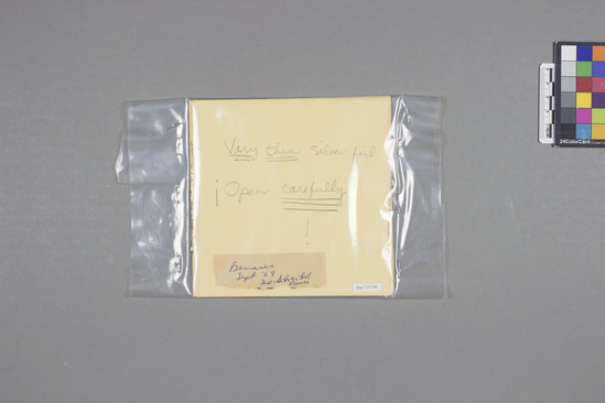 Hearst Museum object titled Foil, accession number 9-11634, described as Silver foil; twenty leaves; packet 14.3 x 14.3 cm