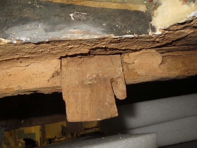 Hearst Museum object 93 of 167 titled Coffin, accession number 6-19912, described as Wooden anthropoid coffin. Inscription running down center of lid. Determined by Kea Johnston to probably be the outer coffin of Iwefaa (6-19928, 12-11039). According to Kea Johnston, "This coffin belonged to a man named Iwefaa, whose name is inserted in the middle of the spells written in the two columns on the front. This coffin is likely the outer coffin for PAHMA 6-19928 based on the similarity of the owner's name, unusual costume, and the paleography of the inscription. Both coffins were purchased on the antiquities market by George Reisner for Phoebe A Hearst. However, stylistically, they are very similar to a set of coffins known to have come from the site of Akhmim, which was excavated in the 1880s by Gaston Maspero, and which has heavily looted for the antiquities market during this decade." "The pectoral vignette between the text and the collar shows the deceased standing before squatting baboon and is the source of our logo. The hieroglyph for 'sky' is above their heads, and the side borders are formed by a pyramid and the symbol for the West.