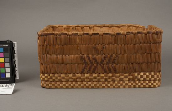 Hearst Museum object 6 of 6 titled Basket with lid, accession number 2-64935a-c, described as With unattached lid. Cedar root coiled over cedar splints, imbricated geometric design. Outer edge of lid broken, one corner of basket broken, lid rim is detached. (a) Basket, (b) lid, (c) lid rim.