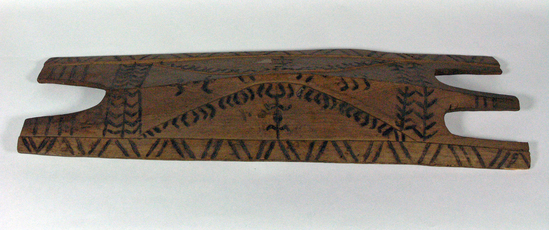 Hearst Museum object titled Shield, accession number 10-669, described as Three prong wooden shield; two prongs at bottom; rectangular; pyro-incised geometric design on front; 31 x 8”