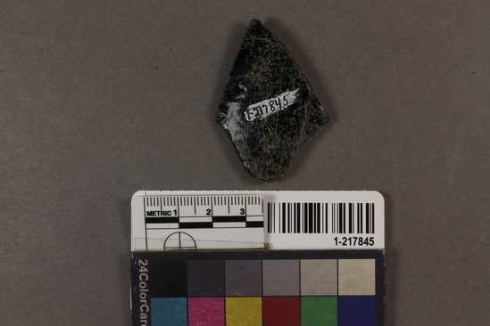 Hearst Museum object titled Glass fragment, accession number 1-217845, described as Dark.