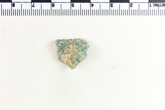 Hearst Museum object titled Glass fragment, accession number 9-7977, described as Glass fragment; blue.