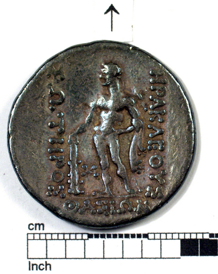 Hearst Museum object 3 of 6 titled Coin: ar tetradrachm, accession number 8-7576, described as Coin: Tetradrachma, Silver, size: 31 mm., weight: 16.84 g., condition: Ex. Obverse: Head of Dionysos wreathed with wine leaves. Reverse: Standing Herakles (Farnese type) with lion’s skin and club. Inscription: HΡΑΚΛEΟΥΣ ΣΩΤHΡΟΣ ΘΑΙΩΝ. Herakles Soteros (Savior), in exerge: Thasos (Thrace).