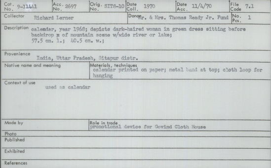 Documentation associated with Hearst Museum object titled Calendar, accession number 9-11441, described as calendar, year 1968; depicts dark-haired woman in green dress sitting before backdrop of mountain scene with wide river or lake; 57.5 cm length; 40.5 cm width; Role in trade - promotional device for Govind Cloth House