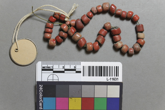 Hearst Museum object titled Beads, accession number L-11631, described as String of trade beads, red with green centers