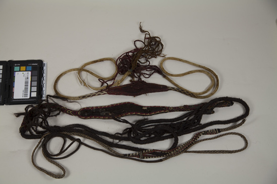 Hearst Museum object titled Sling, accession number TEMP 2018.364, described as collection of slings; each has a different size, pattern, and color; brown, yellow, and red are colors used