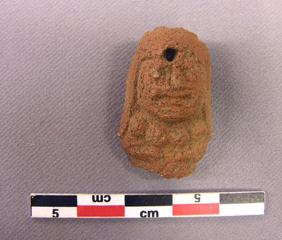 Hearst Museum object titled Potsherd, accession number 4-2512a, described as Fragment of red painted black pottery head of man, perforated.