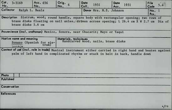 Documentation associated with Hearst Museum object titled Sistrum rattle, accession number 3-3169, described as Sistrum, wood; round handle, square body with rectangular opening; two rows of brass disks floating on nail axles, driven across opening;  L 26.4 cm X W 2.7 cm, Dia of brass disks 5.6 cm