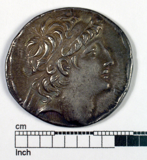 Hearst Museum object titled Coin: ar tetradrachm, accession number 8-4437, described as Coin; AR; Tetradrachm; Greek. 16.43 grams, 33 mm. Antiochus VIII, 121-96 BC. Syria. Obverse: bust of Antiochus VIII r. diademed. Reverse: ΒΑΣΙΛΕΩΣ ΑΝΤΙΟΧΟΥ ΕΠΙΦΑΝΟΥΣ, Zeus standing l. diademed, holding star and long scepter; in exergue, M.