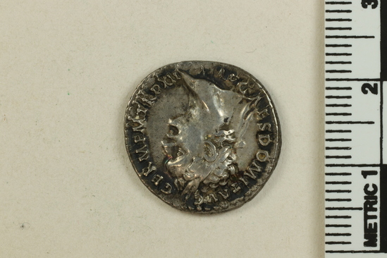 Hearst Museum object titled Coin: ar denarius, accession number 8-9430, described as AR denarius. Domitian. Obverse: Head. Reverse: Minerva.