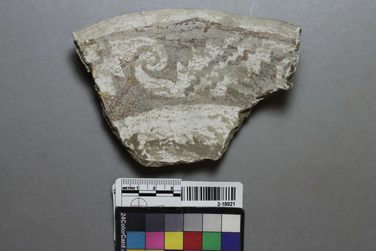 Hearst Museum object titled Potsherd, accession number 2-18921, described as Painted rim sherd, black on white.