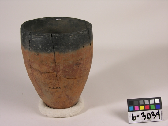 Hearst Museum object titled Broken jar, accession number 6-3034, described as Black-topped redware jar, broken; diameter mouth 16 cm, height 23 cm