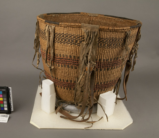 Hearst Museum object 2 of 2 titled Burden basket, accession number 2-18293, described as Twined, buckskin fringe.