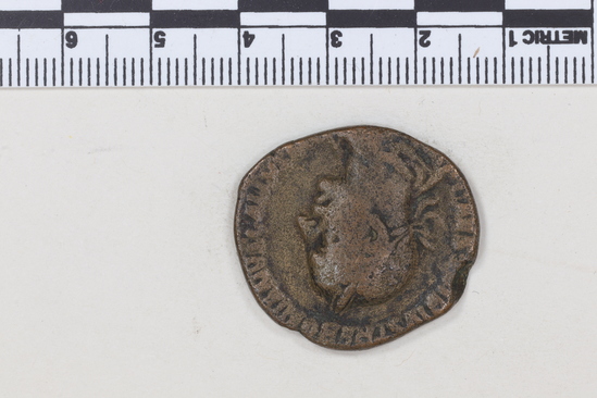 Hearst Museum object 8 of 8 titled Coin: æ sestertius, accession number 8-6009, described as Coin: Once sestertius (?); Æ; Trebonianus - 11.66 grams. Obverse: [IMP]CAESVIBIVS TREBONIANVS GALLVS AVG - Bust facing right, draped, laureate. Reverse: IVNONIMAR[TIALI], SC - Juno seated front in round distyle temple: at her side, peacock.