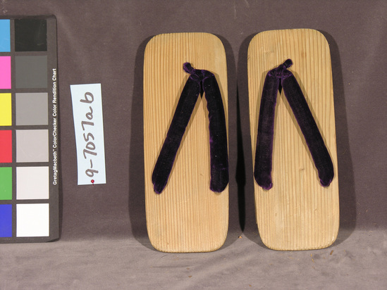 Hearst Museum object titled Sandals, accession number 9-7057a,b, described as Pair wood clogs; purple velvet straps