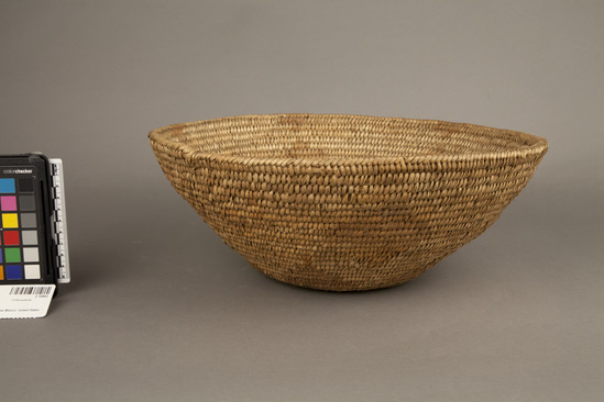 Hearst Museum object 2 of 3 titled Basket, accession number 2-10802, described as Round, coiled, pale brown and yellow decoration, geometric pattern.