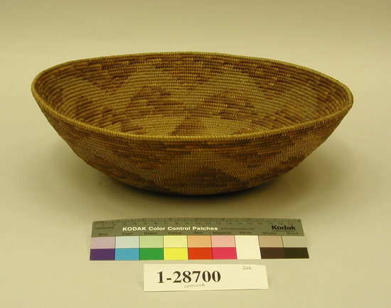 Hearst Museum object titled Bowl basket, accession number 1-28700, described as Flaring coiled basketry bowl.  Brown triangle design.