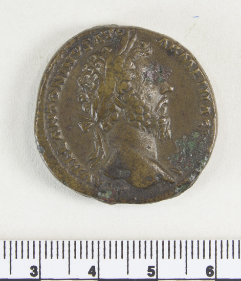 Hearst Museum object 2 of 8 titled Coin: æ sestertius, accession number 8-4865, described as Coin; AE; Sestertius; Roman. 27.70 grams, 32 mm. Marcus Aurelius, 165-166 AD. Rome, Italy. Obverse: M AVREL ANTONINVS AVG ARMENIACVS PM, bust r. laureate. Reverse: TR.POT XX IMP III COS III, Providentia standing l. holding wand and scepter, globe at feet; in field S.C.