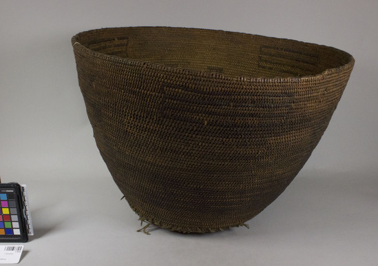 Hearst Museum object 3 of 3 titled Cooking basket, accession number 1-10334, described as Cooking basket; coiled. Warp is Willow (Salix), weft is Redbud (Cercis occidentalis). Red pattern is Redbud. 3-Rod coiling with interlocking stitches; made with split shoots of unpeeled redbud; wide-mouthed with sloping sides.  Decoration: triangles and banded designs in red.