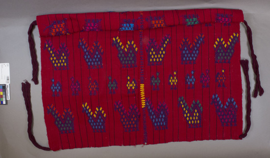 Hearst Museum object titled Tzute, accession number 3-29568, described as Scarf; red with thin black vertical stripes; alternating rows of horses and birds in purple with multi-color woven accents; two panels centrally joined with purple, yellow and orange randa (hand-stitched joining); long red-violet tassel sewn to each corner; 72 cm x 73.5 cm. Native name; tzute: scarf, utility cloth. Materials, techniques; cotton; predominately warp face weave, supplementary weft patterning.