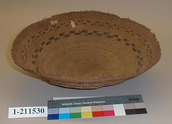 Hearst Museum object 1 of 2 titled Winnowing tray, accession number 1-211530, described as Twined. Designs in redbud.