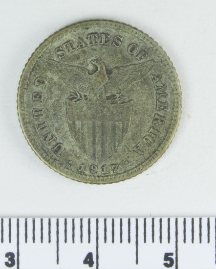 Hearst Museum object 3 of 4 titled Coin: ar 20 centavos, accession number 10-2711, described as Coin; Ag; 20 centavos. Obverse: female with hammer and anvil. Reverse: American Eagle and crest. 1917.