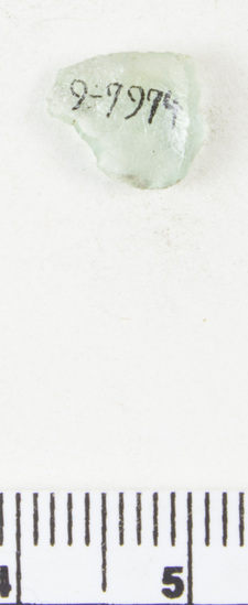 Hearst Museum object titled Glass fragment, accession number 9-7974, described as Glass fragment; green