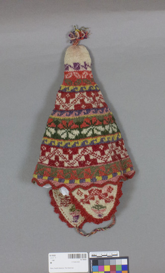 Hearst Museum object titled Cap, accession number 16-18569, described as Cap; ear flaps; knitted; varicoloured; 22 cm by 38 cm; doubled; irreg.