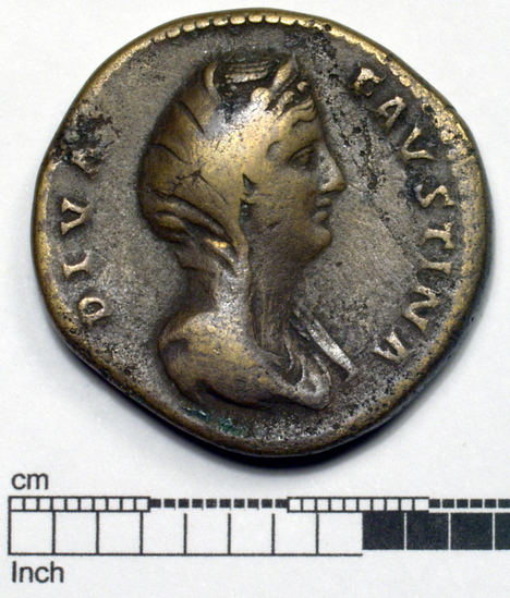 Hearst Museum object 1 of 8 titled Coin: æ sestertius, accession number 8-6002, described as Coin: Sestertius; Æ; Faustina [approximately symbol] 24.66 grams. Obverse: DIVA  FAVSTINA  - Bust facing right, veiled, draped. Reverse: AETER   NITAS, SC in field; Fortuna, draped, standing facing left, holding globe on extended right hand and long rudder, vertical, in left.