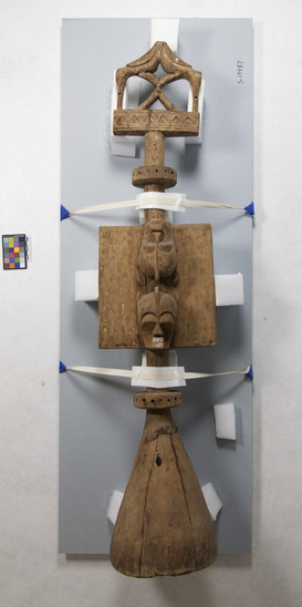 Hearst Museum object titled Headpiece, accession number 5-13487, described as Ijo headpiece; carved, oblong, with square panel w/ two anthropomorphic faces. 40”. Purchased, 1972, $250. Western Ijo. West of Nun River.