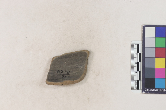 Hearst Museum object 2 of 2 titled Potsherd, accession number 16-8128, described as Potsherd; rim, incised design Section of Manta beach currently inhabited. Numbers  8111 to 8194 are sherds picked up on beach at low tide.