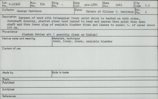 Documentation associated with Hearst Museum object titled Harpoon, accession number 2-19366, described as Harpoon of wood with triangular ivory point which is barbed on both sides. Foreshaft missing, plaited sinew cord lashed to head. The cord passes through point then down shaft and through ivory plug of sealskin bladder float, then lashes to spear.