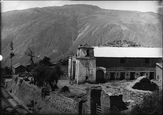 Hearst Museum object titled Black-and-white negative, accession number 15-2025, described as View of large building (church) with stone wall in front