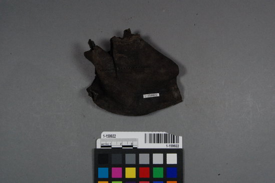 Hearst Museum object titled Boot leather, accession number 1-159922, described as Fragment of soft boot leather with sewn seams