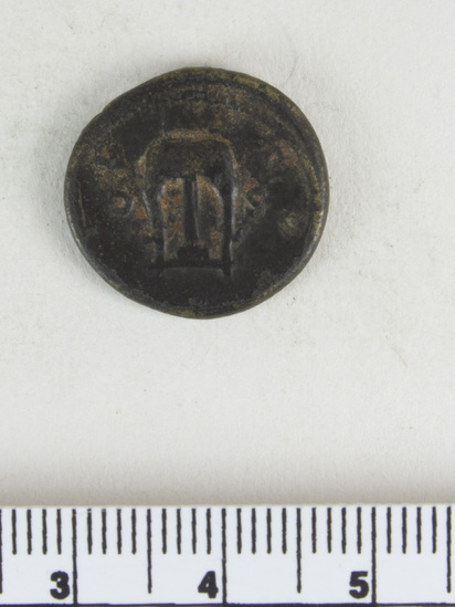 Hearst Museum object 13 of 14 titled Coin: æ semis, accession number 8-8133, described as Coin; Æ; aes grave; semis; Orichalcum. 3.751 grams. Obverse: Head of Hadrian, facing right. Reverse: S C flanking object.