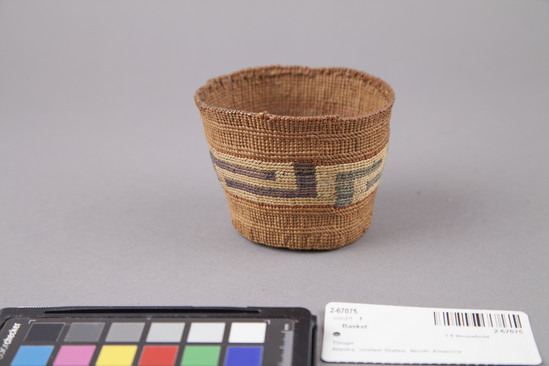 Hearst Museum object 3 of 3 titled Basket, accession number 2-67075, described as Small, twined with slight flare, band of yellow with 4 sets of interlocking green or purple lines, 2 red bands around yellow, 4 bands of double rows of overlayed stitching.