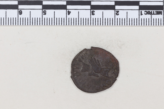 Hearst Museum object 2 of 8 titled Coin: billon antoninianus, accession number 8-4380, described as Coin; Billon; Antoninianus; Roman. 3.14 grams; 21 mm. Marius, 268 AD. Cologne, Germany. Obverse: IMP C MARIVS P F AVG, bust r. radiate. Reverse: CONCORDIA MILITVM, Clasped hands.