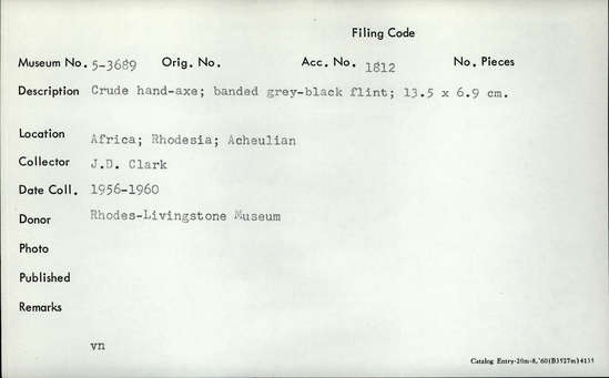 Documentation associated with Hearst Museum object titled Handaxe, accession number 5-3689, described as Crude hand-axe; banded grey-black flint; 13.5 x 6.9 cm.