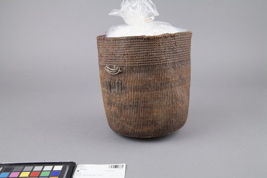 Hearst Museum object 2 of 2 titled Basket, accession number 2-9125, described as Twined, with inset cord handles on sides below ribbed rim.