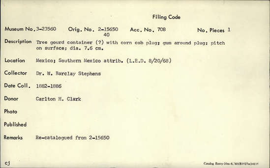 Documentation associated with Hearst Museum object titled Gourd container, accession number 3-23560, described as Tree gourd container (?) with corn cob plug; gum around plug; pitch on surface; diameter: 7.6 cm.