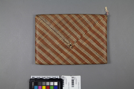 Hearst Museum object 2 of 2 titled Woven envelope type pouch, accession number 10-2591a,b, no description available.