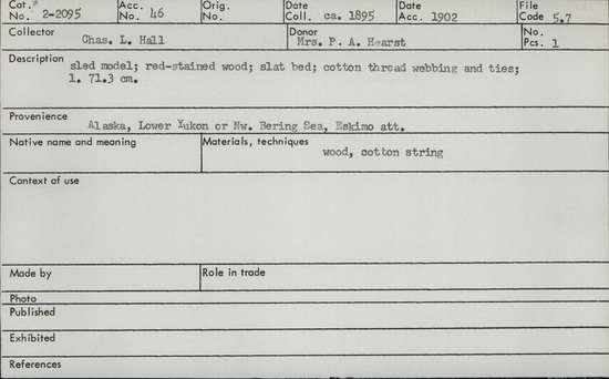 Documentation associated with Hearst Museum object titled Sled model, accession number 2-2095, described as Red-stained wood; slat bed; cotton thread webbing and ties.