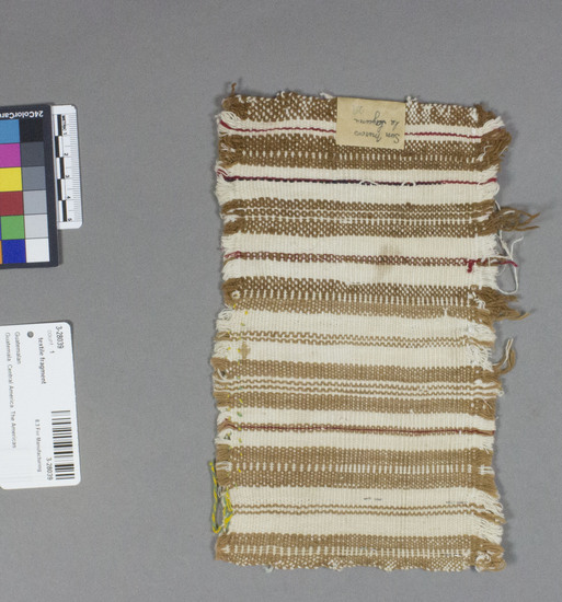 Hearst Museum object titled Textile fragment, accession number 3-28039, described as Fragment. Cotton. Technique: 2-4 basket weave, feather stitch embroidery at one edge. White ground; red and brown stripes, green and yellow embroidery.  5 by 8.5 inches. “Old Perraje” Location: San Marcos/La Laguna
