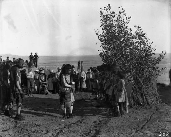 Hearst Museum object titled Black-and-white negative, accession number 15-302, described as Priest at end of corn meal line between snakes and antelopes; Snake dance.