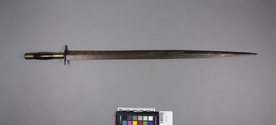 Hearst Museum object 1 of 2 titled Sword, accession number 10-696, described as Two-edged sword; handle brass and wood