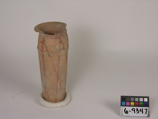 Hearst Museum object titled Broken jar, accession number 6-9347, described as Pottery: jar, cylindrical neck, broken, wavy line, network decoration, least diameter 10 cm, shoulder diameter 9 cm, height 24 cm.