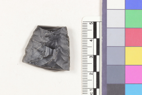 Hearst Museum object 2 of 2 titled Flake fragment, accession number 16-14388, described as Projectile point fragment; obsidian; triangular; weight: 6.79 grams; length: 2.75 cm; width: 2.94 cm; depth: 0.75 cm.