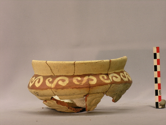 Hearst Museum object titled Bowl, accession number 4-2670, described as Small bowl of red pottery, white outside with red band around base of neck, white S-like figures on band and white triangles pointing upward on lip.