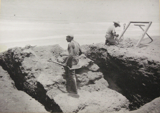 Hearst Museum object titled Photograph, mounted, accession number 13-3976, described as Photo; Excavation in mound, Rio Seco, Chancay. Pre-Ceramic Period.