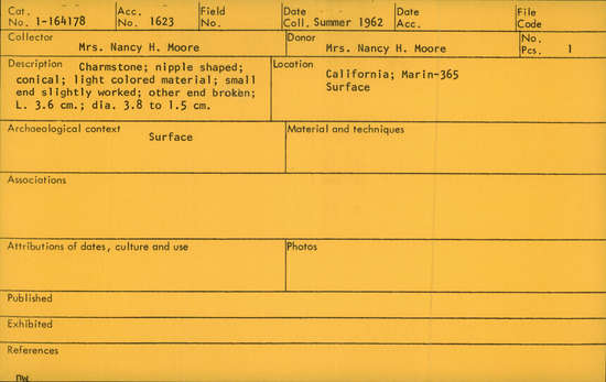Documentation associated with Hearst Museum object titled Charmstone, accession number 1-164178, described as charmstone; nipple shaped; conical; light colored material; small end slightly worked; other end broken; L. 3.6cm; dia. 3.8cm to 1.5cm